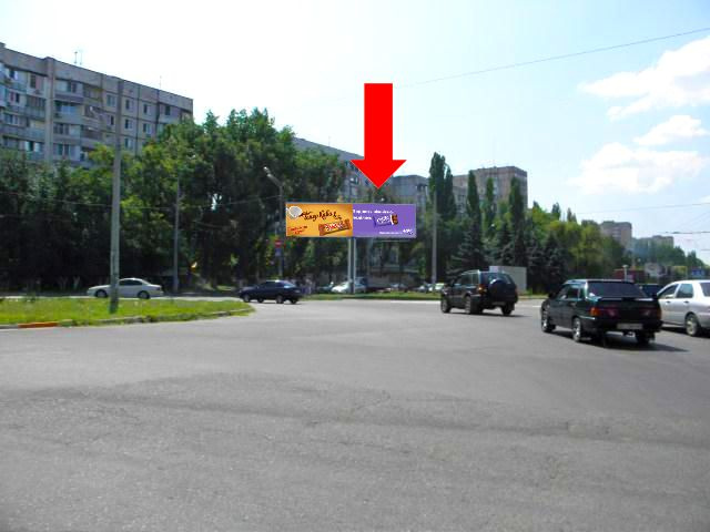 Щит 6x3,  Небесной Сотни пр. (бывш. Жукова пр.) 75 / Левитана ул., возле супермаркета "Копейка", разделитель, из центра, правая