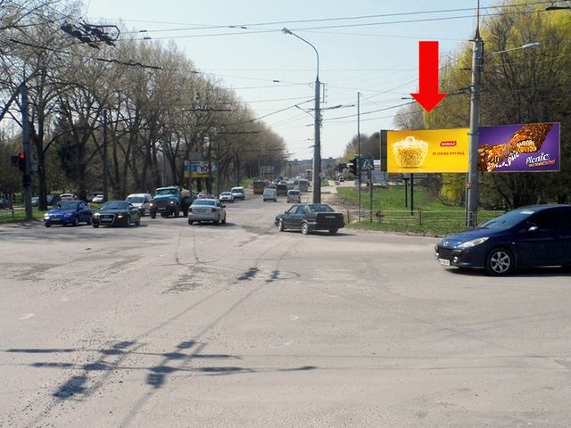 Щит 6x3, Злуки пр. / 15-го Апреля ул., возле ТЦ "Мандарин", супермаркета "Сильпо", в центр, левая Щит 6x3, Злуки пр. / 15-го Апреля ул., возле ТЦ "Мандарин", супермаркета "Сильпо", в центр, левая