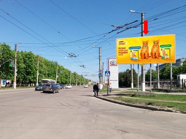 Щит 6x3,  Тельнова ул. (бывш. Правды пр.) / Коваленко ул. (бывш. Конева ул.), возле супермаркетов "Велика Кишеня", "Comfy", в центр
